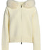 Ivory cashmere jacket with soft fox fur trim, offering a luxurious and timeless loungewear look.