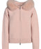 Light pink cashmere jacket with plush fox fur trim, perfect for soft and feminine loungewear elegance.